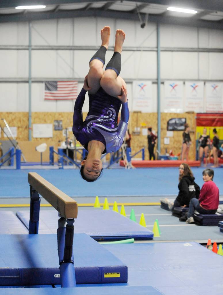 Tumbling together: Trio of Sequim athletes find solidarity, success in cross-peninsula gymnastics squad