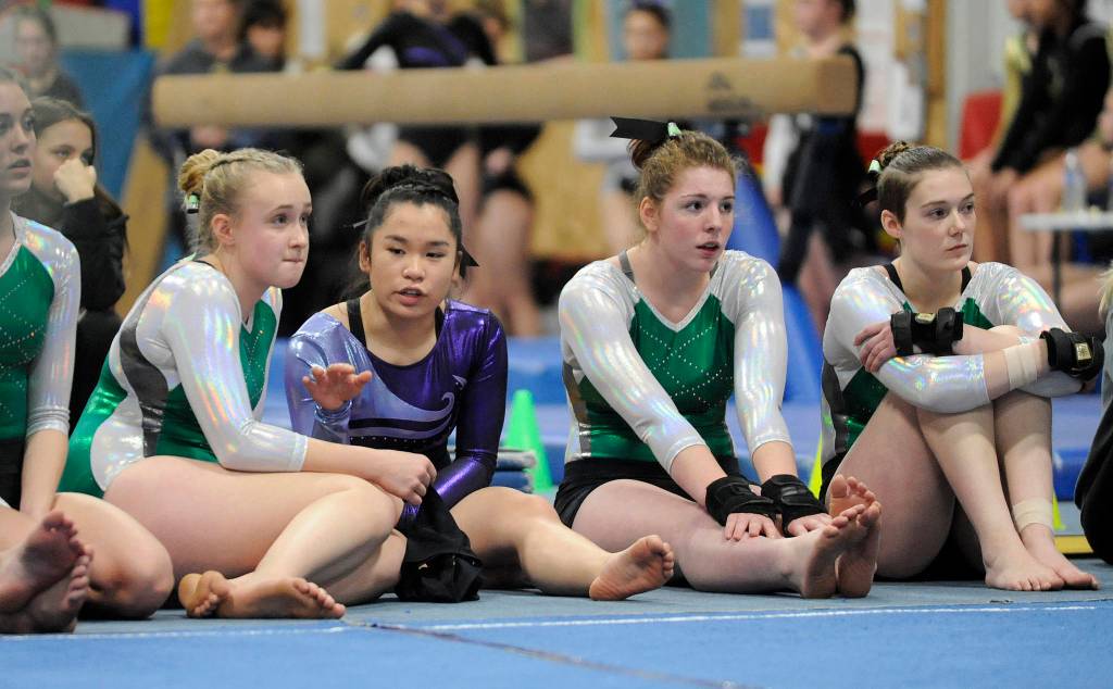 Tumbling together: Trio of Sequim athletes find solidarity, success in cross-peninsula gymnastics squad