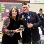 Rod Lee, Quartermaster for the Carlsborg VFW Post 4760, presents Greywolf Elementary School teacher Alex Ogilvie with the Smart/Maher VFW Teacher of the Year Award. Photo by Darcy Lamb