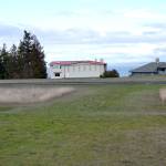 Members of the Diamond Point Airport Association hope to pave this 40-feet-by-40-feet grass area to improve the airports helipad. Sequim Gazette photo by Matthew Nash