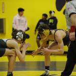 In the second round of sub-regionals, Sequims Jamie Schroepfer, right, quickly pins Port Angeles Nate Harrelson and he went on to take third place in the tournament at 132 pounds. Sequim Gazette photo by Matthew Nash