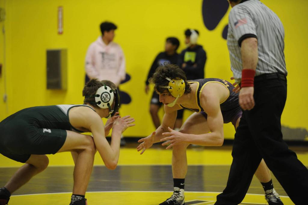 In the second round of sub-regionals, Sequims Jamie Schroepfer, right, quickly pins Port Angeles Nate Harrelson and he went on to take third place in the tournament at 132 pounds. Sequim Gazette photo by Matthew Nash