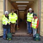 Members of Gardiners Community Emergency Response Team, from left, Dick Bennett, Bill Campbell, Bob McCauley and Mickey Hodis stand outside the teams storage container they raised funds for to hold search and rescue supplies. In case of a major earthquake, team members will use it as a headquarters as search operations begin. Sequim Gazette photo by Matthew Nash