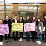 Sequims Victoria Cummins, third from right, stands with members of the University of Washingtons club Campus Animal Rights Educators, or CARE, as they deliver a letter and a petition to King County Executive Dow Constantine last December asking for the university to stop using live pigs in its training to open airways. Photo courtesy of Ivanna Renee de Anda