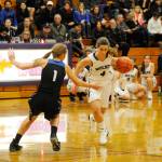 Basketball is just one of the many sports Pilar Aliseda, right, has participated in since she arrived in Sequim last August as an exchange student from Spain. Sequim Gazette photo by Michael Dashiell