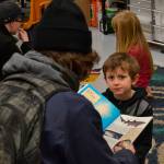 Second grader Kaleb Pemberton in Aria Benners class at Helen Haller Elementary listens in on a story about sharks.