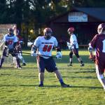 Mason Larsen, in center, and Tommy Hall, in goal, look to defend against South Kitsaps midfielder Gabriel Paulus during the Port Angeles-Sequim Mountaineers home opener on March 15 at the Agnew Fields. The Mountaineers lost 8-2. Sequim Gazette photo by Matthew Nash