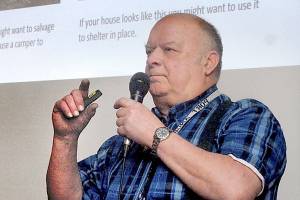 Earthquake-preparedness advocate and former state legislator Jim Buck of Joyce gives a presentation at the Port Angeles Public Library in January on how to prepare for a large Cascadia quake. Photo by Keith Thorpe/Peninsula Daily News