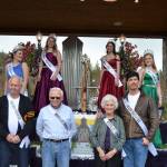 Dignitaries with the Sequim Irrigation Festival stand together on March 24 after the festivals float was revealed at the Kick-Off Dinner at 7 Cedars Casino. Present for the float reveal and dinner, were from top left, Princess Gabi Simonson, Princess Gracelyn Hurdlow, Queen Erin Gordon, Princess Eden Batson; front left, Grand Pioneer Don Ellis, Honorary Pioneer Ross Hamilton, Honorary Pioneer Lorelle Agostine, and Grand Marshal Dave McInnes. Not pictured, Grand Pioneer Wilma Rhodefer Johnson. Sequim Gazette photo by Matthew Nash