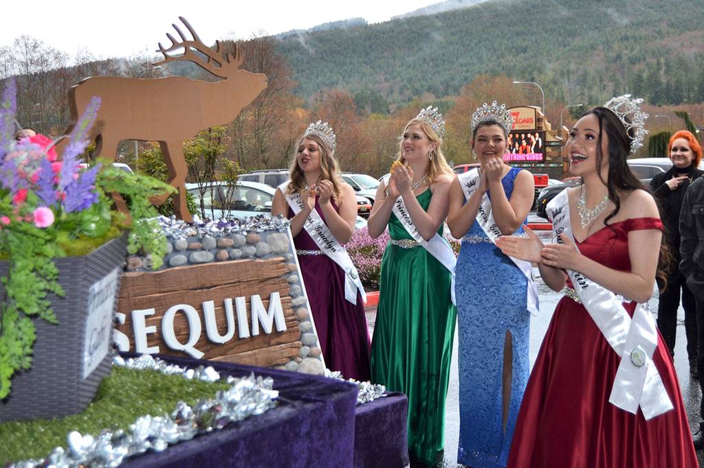 Queen Erin Gordon readies to walk onto the Sequim Irrigation Festival royalty float for the first time on March 24. She and fellow royalty, from left, Princess Gracelyn Hurdlow, Princess Eden Batson, and Princess Gabi Simonson saw the float for the first time at the festivals Kick-Off Dinner at 7 Cedars Casino. Sequim Gazette photo by Matthew Nash
