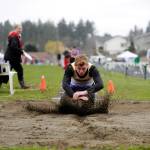 Sequim freshman Logan Laxson takes top honors in the long jump with an 18-foot, 2.5-inch leap at last weeks Flying A Retro track and field meet in Port Angeles on March 29. Sequim Gazette photo by Michael Dashiell