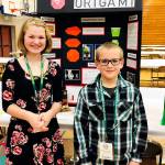 Greywolf Elementary students Sophie Morton and Owen Douglas display their award-winning project at the 2018 Washington State Science and Engineering Fair. Submitted photo