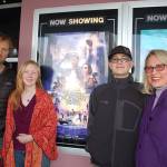 In honor of Robby Streett, his family and friends filled the theater at Deer Park Cinema on March 30 for the showing of his favorite book adapted into a film, Ready Player One. Josh Gloor, left, Robbys girlfriend Hannah Gloor, Robbys mother Josslyn Streett and younger brother Sawyer Streett were among those who watched the film and celebrated Robbys love for the book. Sequim Gazette photo by Erin Hawkins