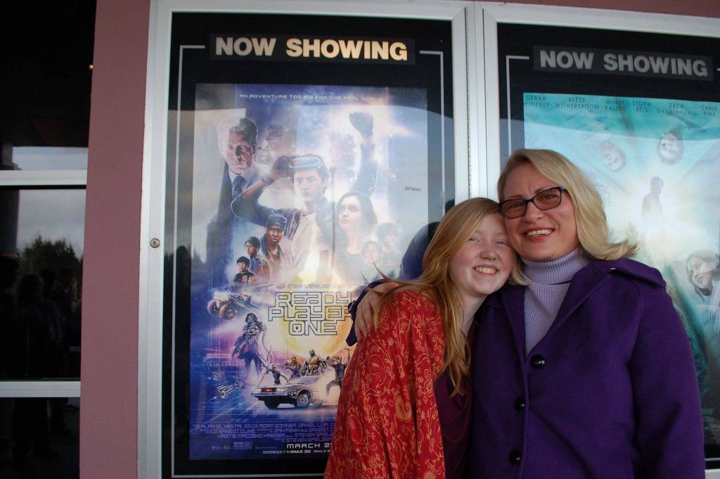 Robby Streetts girlfriend Hannah Gloor, left, and his mother Josslyn Streett, right, stand together after watching Ready Player One in Robbys honor on March 30 at Deer Park Cinema. Sequim Gazette photo by Erin Hawkins