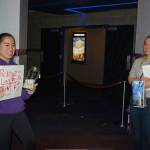 Sequim High School sophomore Lesae Pfeffer, left, and senior class president Anabelle Armstrong fundraise at Deer Park Cinema before the film Ready Player One in honor of Robby Streett and aim to raise money to to help the Sequim High Library purchase new furniture and help students indulge in one of Robbys favorite activities of reading. Sequim Gazette photo by Erin Hawkins