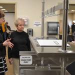 Sarah Van Ausdle, public works management analyst, on left, shows Arlene Rayniak of Sequim whats new inside the Guy Cole Events Centers kitchen on March 28. The City of Sequim used a state grant to fund a portion of the remodel. Sequim Gazette photo by Matthew Nash