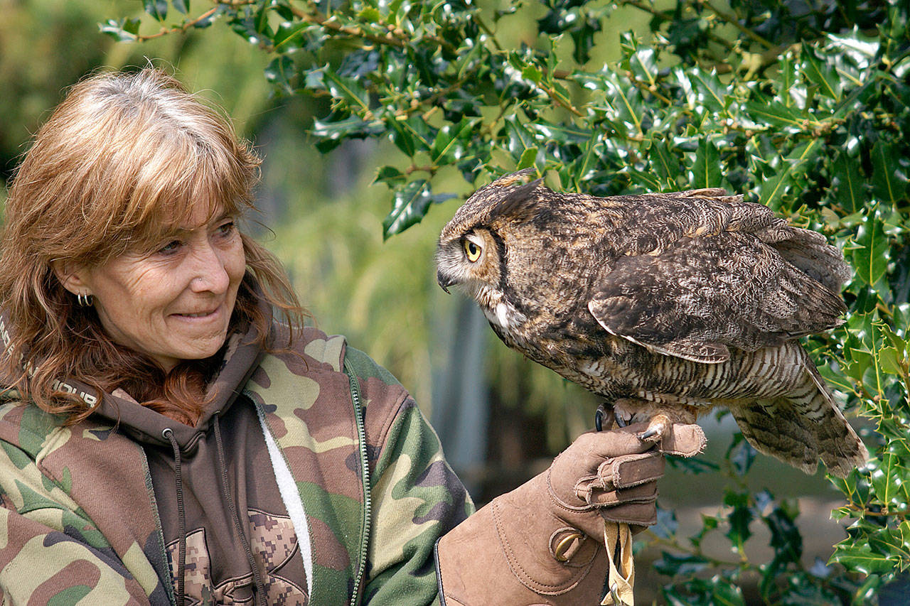 Jaye Moore, director of the Northwest Raptor and Wildlife Center, is a featured presenter on April 15 at Railroad Bridge Park, following the awarding of a grand prize and peoples choice award for BirdFest-BirdQuest.