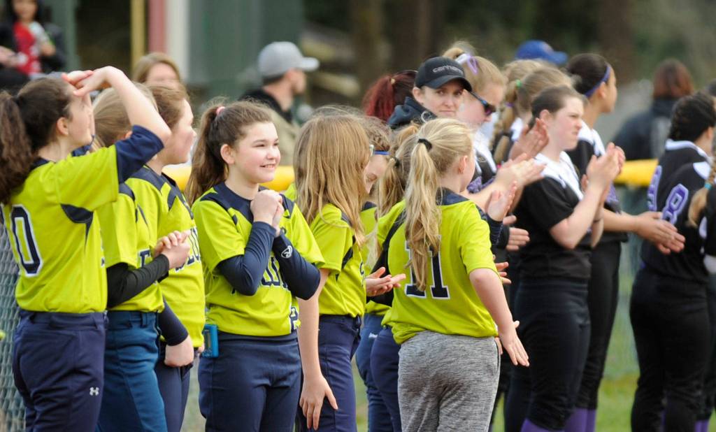 This year, Sequim Little League hosts 22 teams including co-ed T-ball, co-ed machine pitch, minors and majors for girls and boys, and fastpitch for girls 13 and up. Sequim Gazette file photos by Michael Dashiell