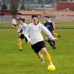 Sequim High exchange student Hayuk Minano (7) leads a breakaway with teammate Ryan Tolberd following the play in the first half of Sequims 5-0 win on April 20. Minano and Tolberd each had a score in the key Olympic League win. Sequim Gazette photo by Michael Dashiell