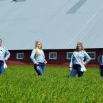 Sequim Irrigation Festival royalty, from left, Princess Gabi Simonson, Princess Eden Batson, Princess Gracelyn Hurdlow, and Queen Erin Gordon stand near the Dick Family Barn during a photo shoot for the festivals programming. Sequim Gazette photo by Matthew Nash