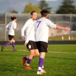 Sequims Liam Harris and exchange student Hayuk Minano celebrate a score against Olympic on April 10. The pari have combined for 17 goals and 11 assists this season (as of April 15).