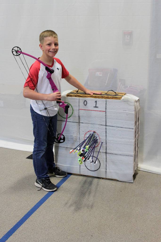 Hunter Tennell shows off his archery skills with a school record 20 bullseyes. Photo by Doug Hastings