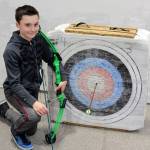 Max Lee scored a rarity at Greywolf Elementary recently, splitting an arrow with a well-placed arrow of his own. Photo by Doug Hastings