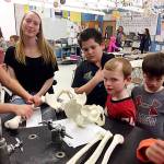 Helen Haller Elementary School students (from left) Mikah Johnson, Taylor Thomas, Javier Paniagua and Ivan Kovalik visit Isaac Rapeljes high school science class. Submitted photo
