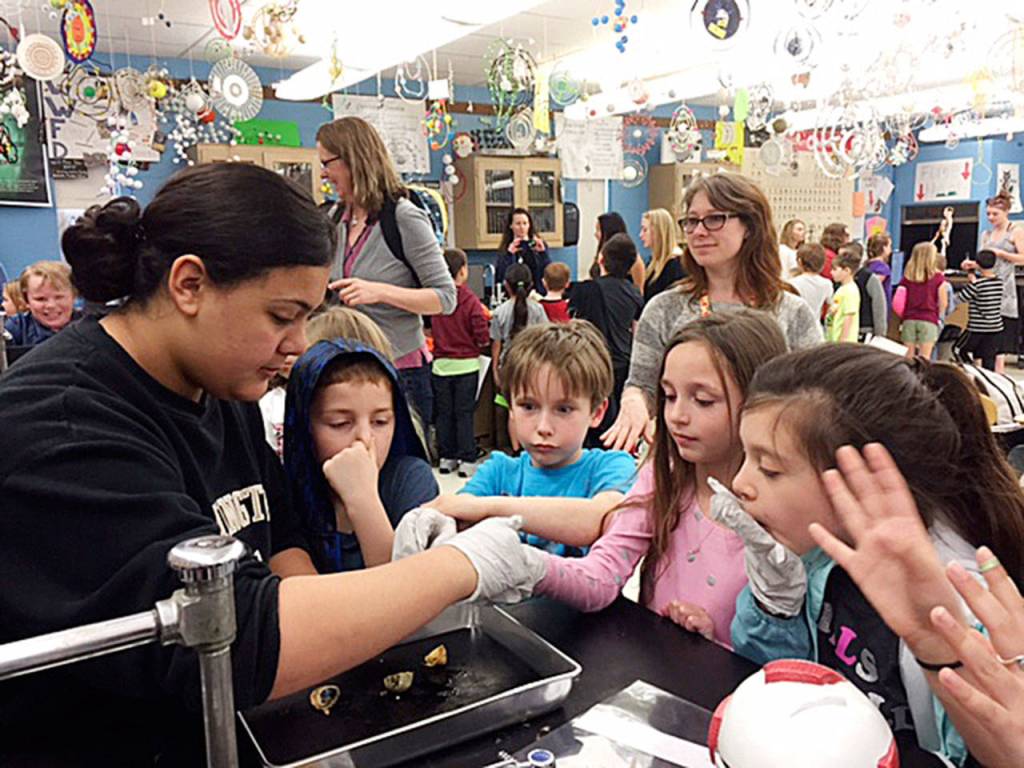 Helen Haller Elementary School students (from left) Chaos Mulet, Aidan Coonelly, Khloee Taylor and Madison Edwards visit Isaac Rapeljes high school science class. Submitted photo