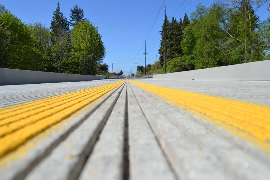 Road crews reopened McDonald Creek Bridge around 1 p.m. May 1 after paint dried on Old Olympic Highway. Sequim Gazette photo by Matthew Nash