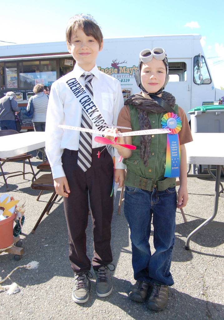 Last years Sequim Irrigation Festival Junior Royalty Malachi Byrne, left, stands with his brother Marcus Byrne dressed as a pilot who won first place during the Kids Parade for its Storybook Theme. Sequim Gazette file photo by Erin Hawkins