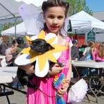 Caitlin Gerdes holds her dog Dell who won first place for the pet contest during the Sequim Irrigation Festival Kids Parade last year. Sequim Gazette file photo by Erin Hawkins