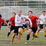 Sequims Liam Harris (8) looks for possession of a corner kick in the first of half of Sequims 6-0 district tourney win over Orting on Saturday. Sequim Gazette photo by Michael Dashiell