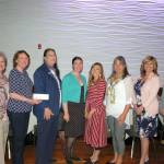 Sequim-Dungeness Hospital Guild president Nancy McGovern, left, presented checks to Sequim Health & Wellness Clinic Executive Director Sara Nicholls, Clinic Director Rose Gibbs, Peninsula College Director of Nursing Dr. Alana Murphy, nursing student Jamie Sanders, Peninsula College Foundation Executive Director Getta Rogers Workman, Olympic Medical Center representatives Kelly North and Registered Nurse Mindy Stephens. Sequim Gazette photo by Erin Hawkins