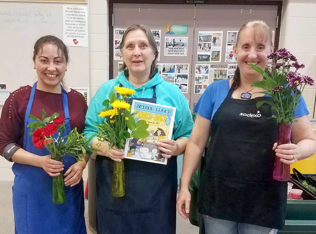 Greywolf Elementary School honors its Lunch Lady Heroes staffers on May 4. Pictured, from left, are Maria Cisneros (a substitute who normally works at Sequim High School) Kim Sharp and Kristi Minkoff. Photo by Tricia Stratton