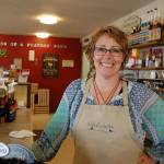 Kristi Grasser, owner of Birds of a Feather Farm stands in the renovated space that has been transformed from a business office into a coffee bar where her business will now offer organic coffee and all-natural ice cream. Sequim Gazette photo by Erin Hawkins