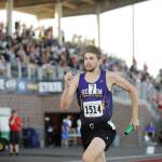 Sequims Alec Shingleton finishes off Sequims 4x400 relay in preliminaries on Thursday, May 24, at the class 2A state track and field championships in Tacoma. With Logan Laxson, Murray Bingham, Darren Salazar and anchor Shingleton competing, the Wolves took third in their heat with a 3:25.40 and qualified for the finals. Sequim Gazette photo by Michael Dashiell