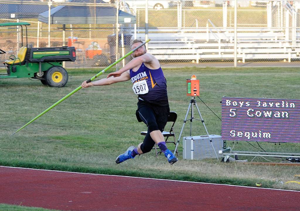 Saving the best for last: Sequims Riley Cowan rears back and launches a 182-foot 6-inch throw in his final effort in the javelin finals on May 24, good for fourth place overall. Cowan set a personal best earlier in the meet, but topped that throw by nearly 13 feet with this final mark.                                Saving the best for last: Sequims Riley Cowan rears back and launches a 182-foot 6-inch throw in his final effort in the javelin finals on May 24, good for fourth place overall. Cowan set a personal best earlier in the meet, but topped that throw by nearly 13 feet with this final mark. Sequim Gazette photo by Michael Dashiell