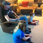 A video game tournament on June 2 at the Sequim Boys & Girls Club benefits Sean McKeown of Sequim, seen here playing video games with his children Madison and Dylan. Sean was diagnosed with multiple sclerosis in 2000 and hes sought alternative treatments after he is unable to use his medicine after 10 years. Submitted photo