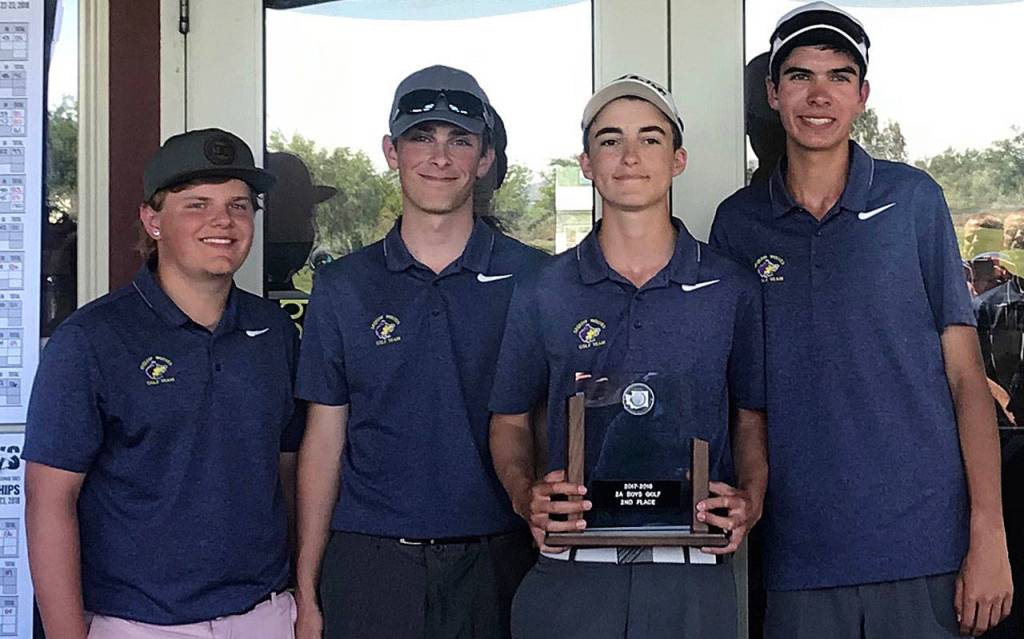 Sequims boys celebrate a second-place finish in the class 2A state tournament in Richland last week. Pictured, from left, are Andrew Vanderberg, Josiah Carter, Paul Jacobsen and Blake Wiker. Submitted photo