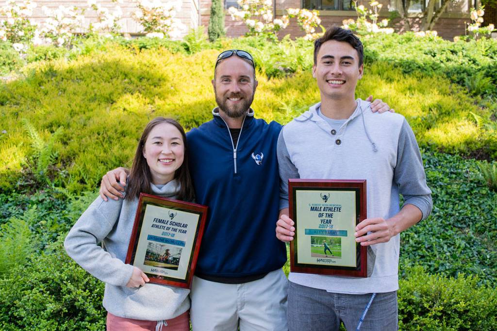 Sequim High grad Alex Barry, right, who was named WWU tracks Male Athlete of the Year, earned All-American honors at the NCAA Division II National Championships in late May, placing fourth in the javelin. Here he is pictured with Jasmine McMullin, a fellow Sequim High graduate and All-American (triple jump), and WWU assistant coach Ben Stensland  another Sequim High School graduate. Submitted photo