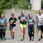 Running with purpose: community members support Special Olympics