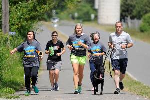 Running with purpose: community members support Special Olympics