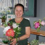 April Lemly, owner of Kamama Flowers, runs a flower bar in Peninsula Taproom open from 12-5 p.m. Tuesday through Friday. Sequim Gazette photo by Erin Hawkins