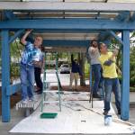 A Sequim Service Fest crew, from left, Sequim Assistant City Manager Joe Irvin, city intern Cassandra Bailey, volunteer Mike Vollenweider, city intern Guy Knapp and author Peter Kageyama paint the gazebo in 1st Security Bank Park on Tuesday.
