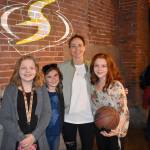 In photo at left, Sequims Destinie Bernard, left, and sisters Pearl and Lily Peterson stand with Seattle Storm guard Sue Bird for a photo on June 5 at a VIP experience in Seattle. Photos courtesy of Dave Miller