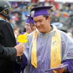 Rain does not stop smiles on this SHS grad parade