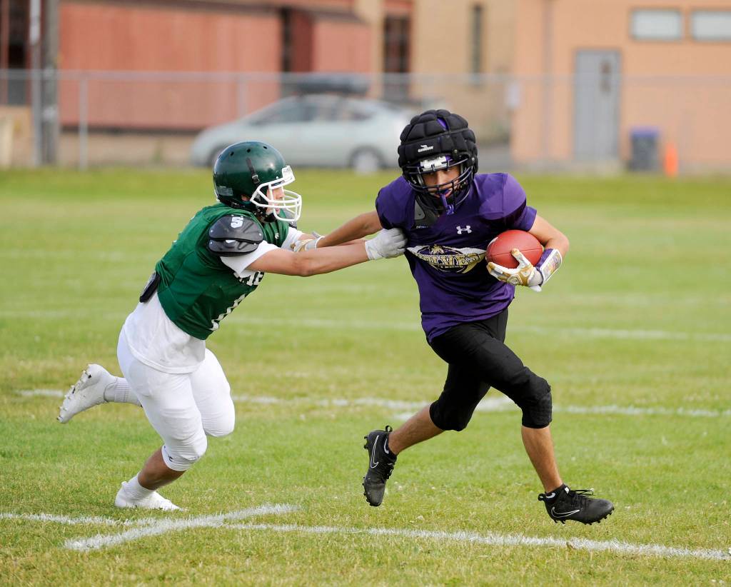 Prep football: Wolves, Riders, Spartans scrimmage