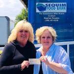 Milestone: Newcomers Club donates to Sequim Food Bank