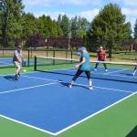 Pickleball players, from left, Ken Sorbel, Glynda Ball, John Anderson and Margie Rone enjoy a game on July 2 on the new pickleball courts in Carrie Blake Community Park. Sequim Gazette photo by Matthew Nash